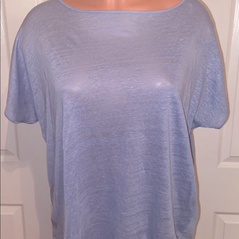 light blue t-shirt.